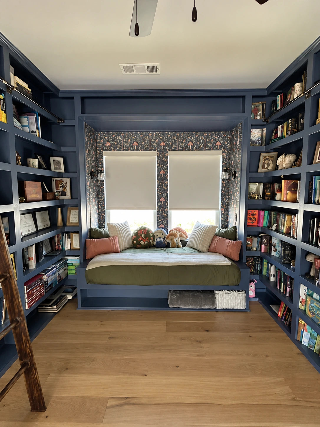 Completed BLINDS100 shades in a library nook